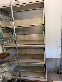 Metal shelving with pull out doors