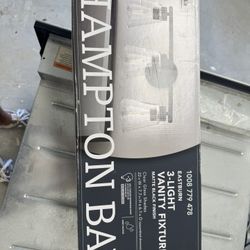 Hampton Bay Eastburn 22 in. 3-Light Matte Black Vanity Light with Clear Glass Shades