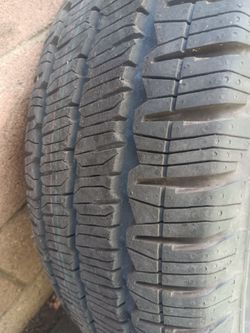 Tire with rim 235/65/16