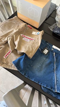 Brand new shorts and skirt