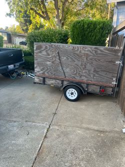 Single Axle Utility Trailer with Wood Sidesity