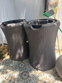 65 gallon rain barrels -nearly new -four available