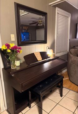 Yamaha Arius YDP-223 digital piano.