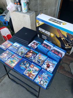 2 Guitar hero Live with 500 songs. 2 Sealed Controls. 2020 1TB PS4 Playstation 4 Pro & 11 Great Games all for $600! Or Trade up challenge