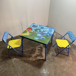 children's table with two chairs