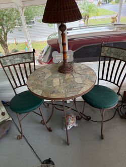 Heavy duty Bristo  table and 2 chairs-iron w/and rock surface