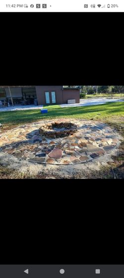 Outdoor Stone Fire Pit with Flagstone Patio