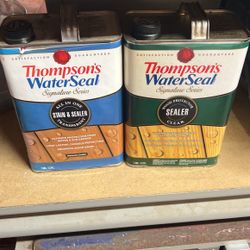 Two New Gallons Of Thompson WaterSeal / One Is Clear And The Other Is Cedar