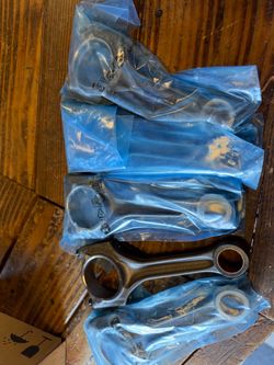 Engine piston rod