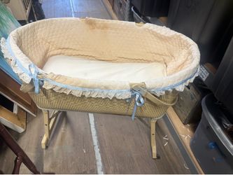 vintage wicker baby bassinet on wheels
