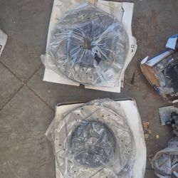 Front 2 rotors and ceramic brake  pads