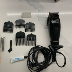 Andis Electric Hair Clipper with attachments