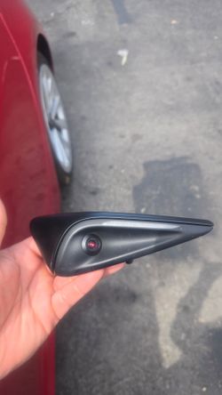 Side repeater camera / fender turn signal assemblyCompatibility: Appears consistent with Tesla Model 3 or Model Y