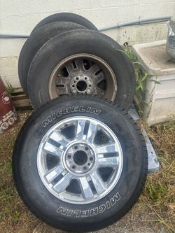 04 tires and rims Six. Lug nuts.