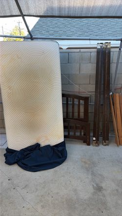 Twin size mattress and wood frame