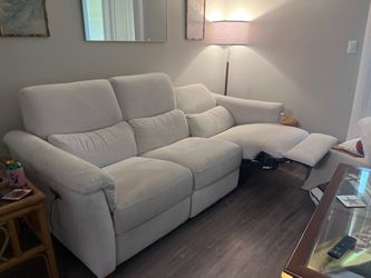 White double recliner Natuzzi italia couch