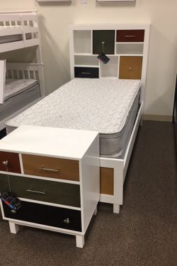 Twin bed WITH nightstand.