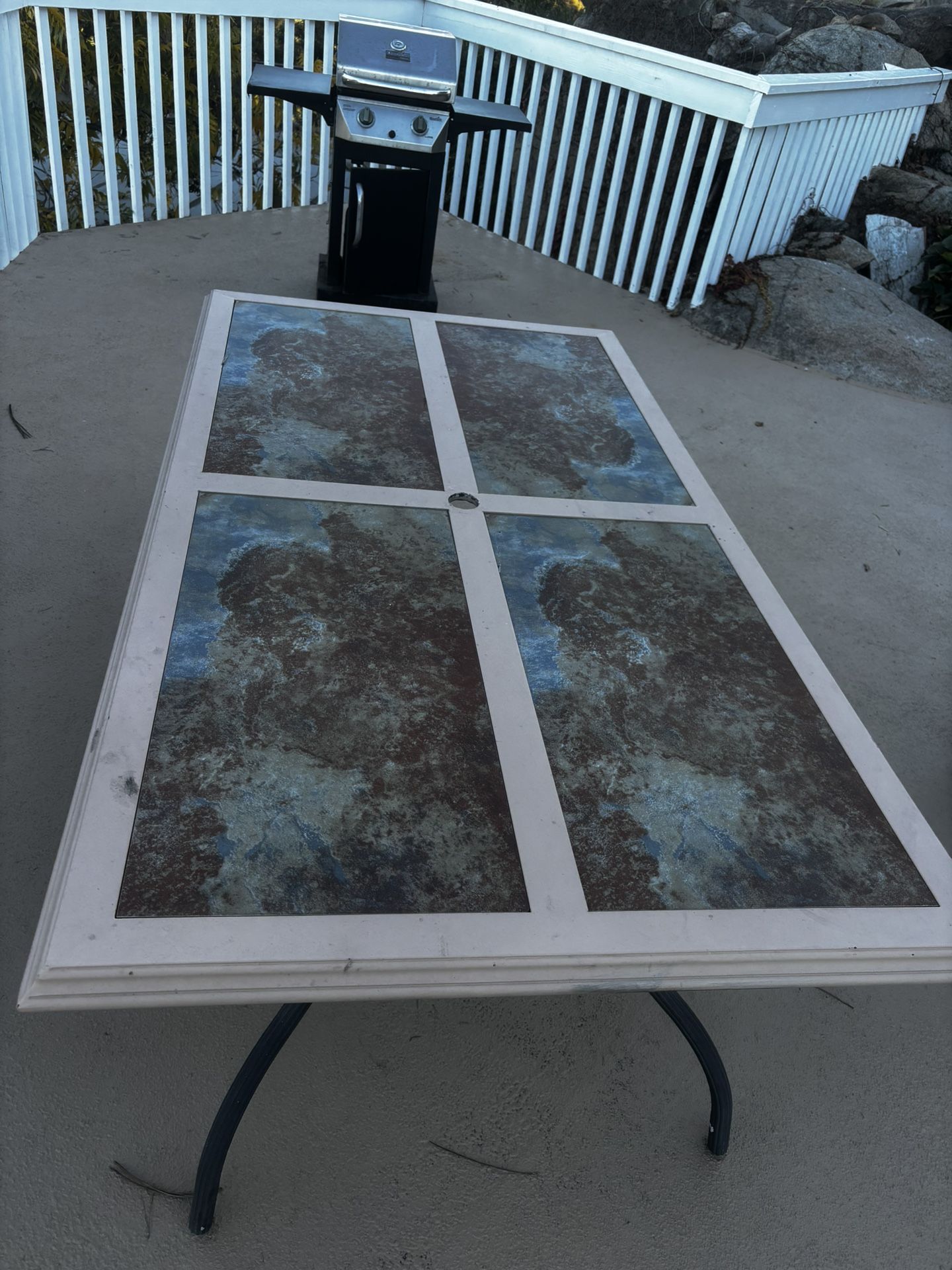 Outdoor ceramic tile table 39in x 71in x 28in