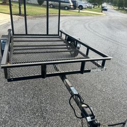 5X8 CARRY ON UTILITY TRAILER./WITH TITLE .