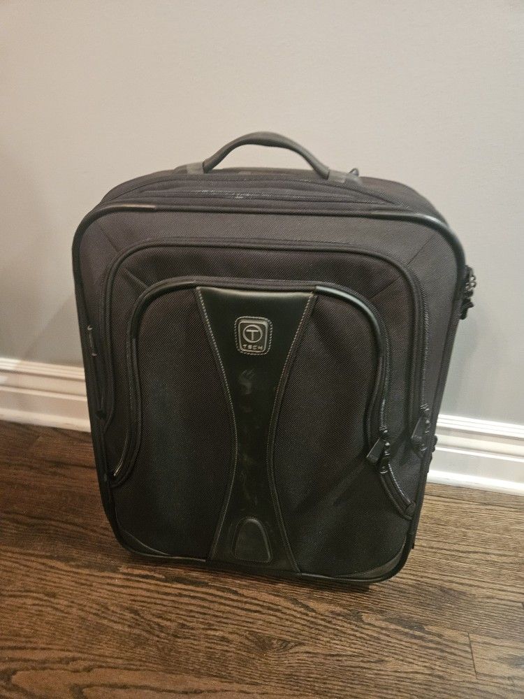 TUMI T-Tech 21" Expandable Carry on Upright luggage. Style 57621D.