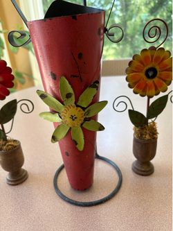 Whimsical flower holder and picture holders