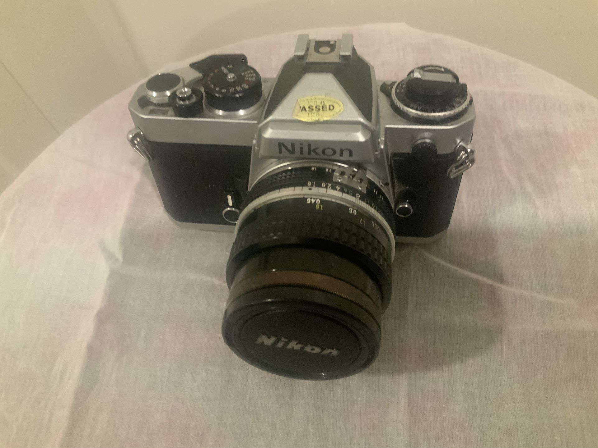 Nikon FE  And Accessories.  $275.00