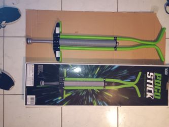 New pogo stick , up to 140lbs 9+ neon green , open box BRAND NEW