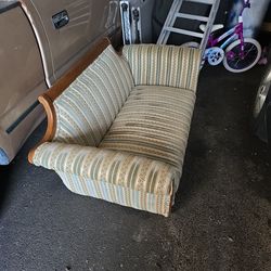 Antique love seat couch