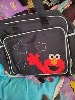 Brand new never used elmo diaper bag with changing pad