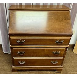 Vintage maple secretary desk with drop front writing surface and 3 drawers