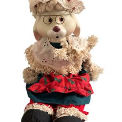 House of Lloyd Christmas Around the World Grannie Flo Bunny shelf sitter figurine.  It is part of the "Christmas Around the World" collection.  The fi