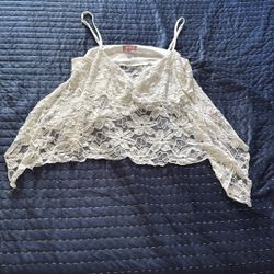 white lace peplum tank top features delicate floral lace detailing and adjustable straps size Xl.