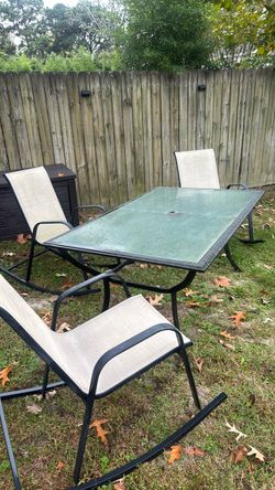 Patio Table and 3 rocking chairs