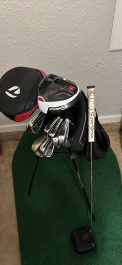 Mens Taylor made set of golf clubs