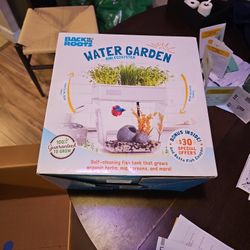 Water Garden - combination fish tank that grows herbs and plants 