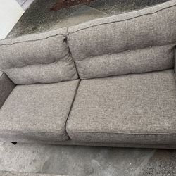 Brown fabric sofa