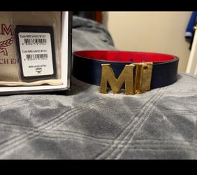 MCM reversible belt red and navy blue with gold buckle