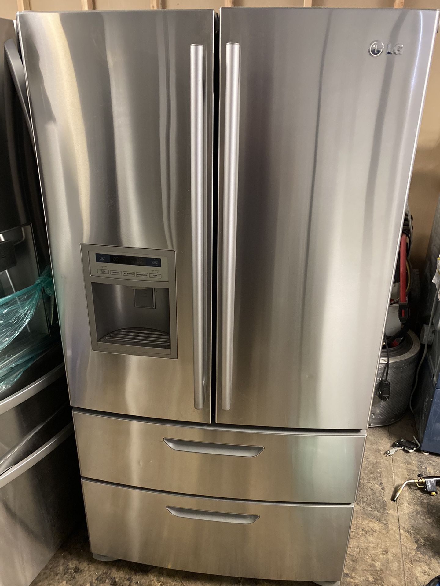 LG FOUR DOOR STAINLESS STEEL REFRIGERATOR