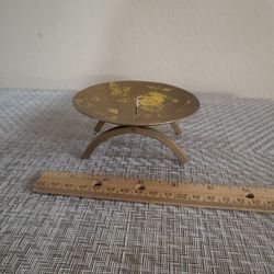 Brass candle holder with central spike plate