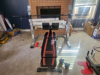 Heavy duty Weider rack and incline/decline bench with olympic barbell set no weights