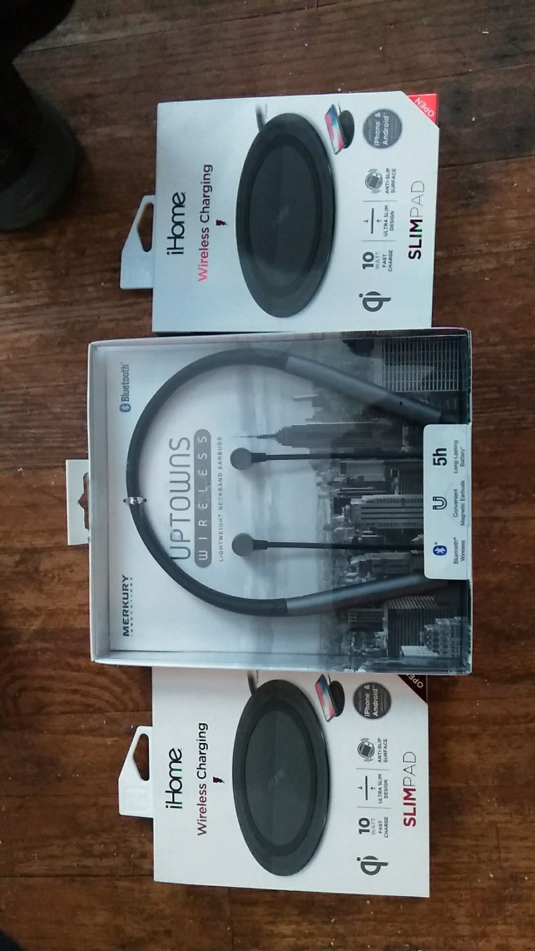 Uptown wireless earbuds and 2 wireless charging pad
