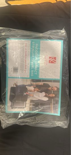 Padded carrier for stroller travel bag