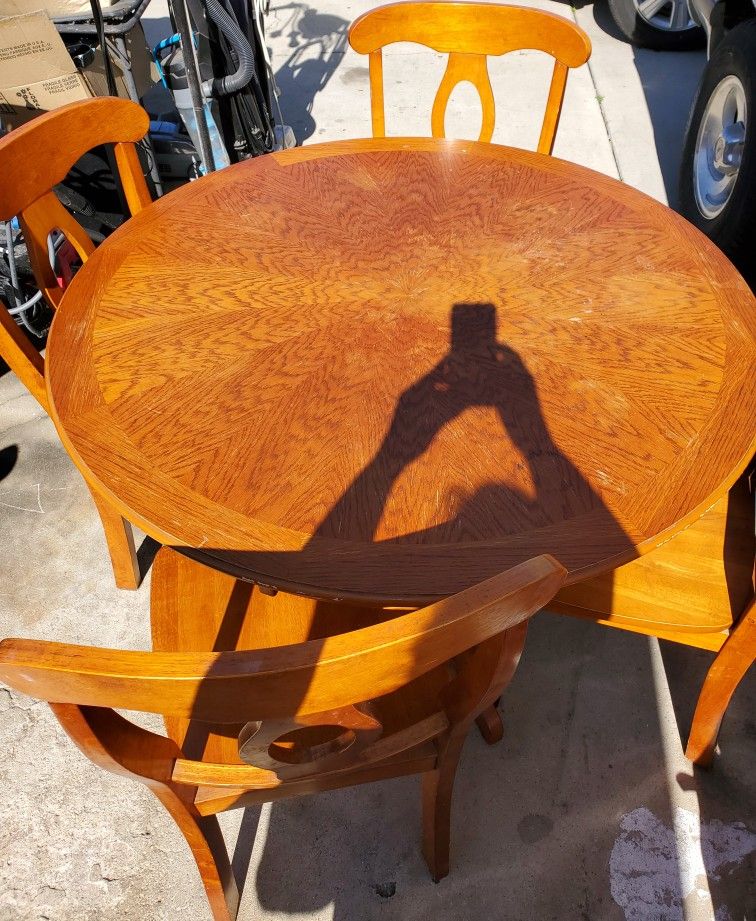 Table And Four Chairs