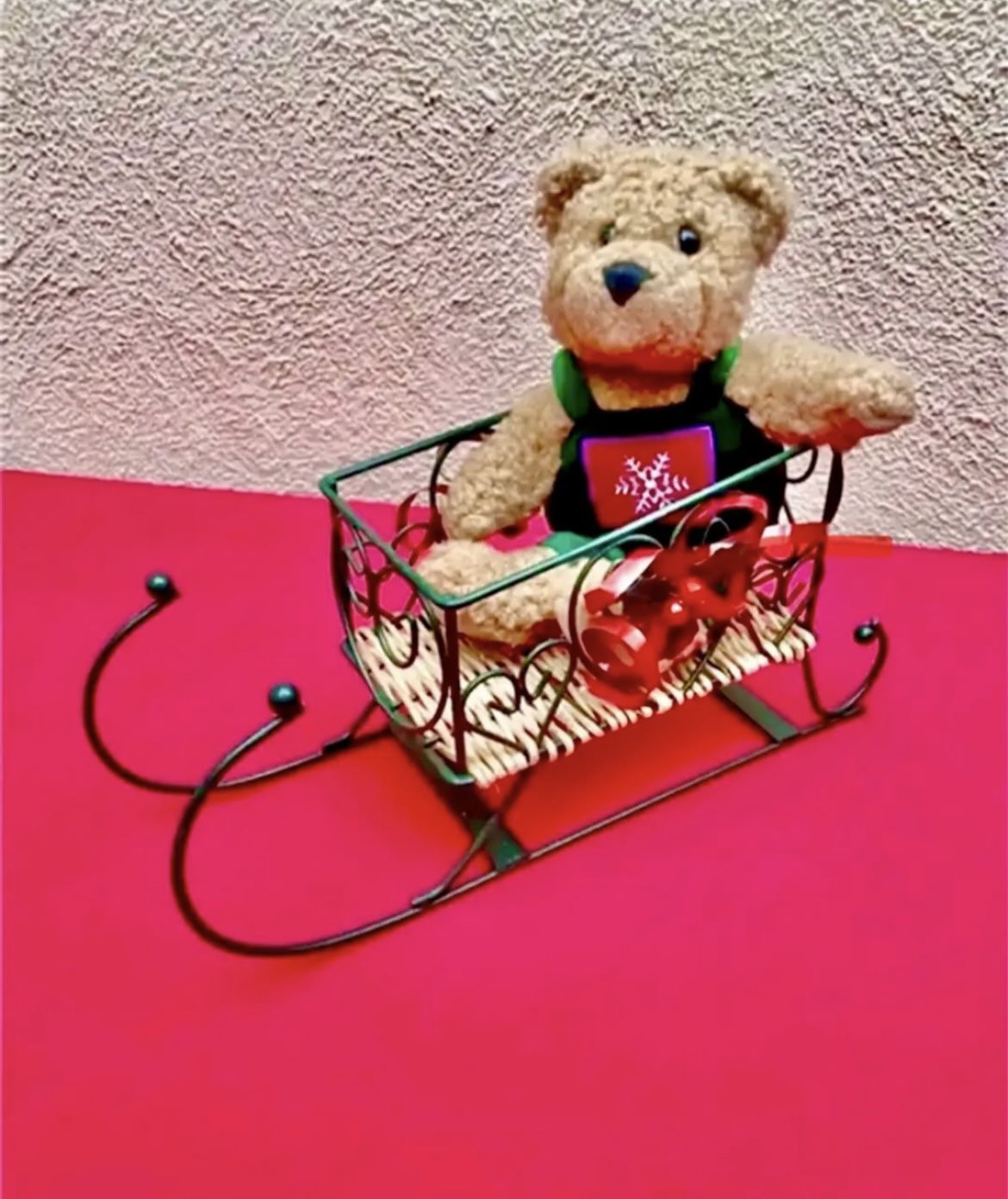 Teddy bear on Christmas sleigh