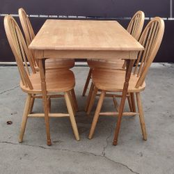 WOODEN TABLE AND 4 CHAIRS