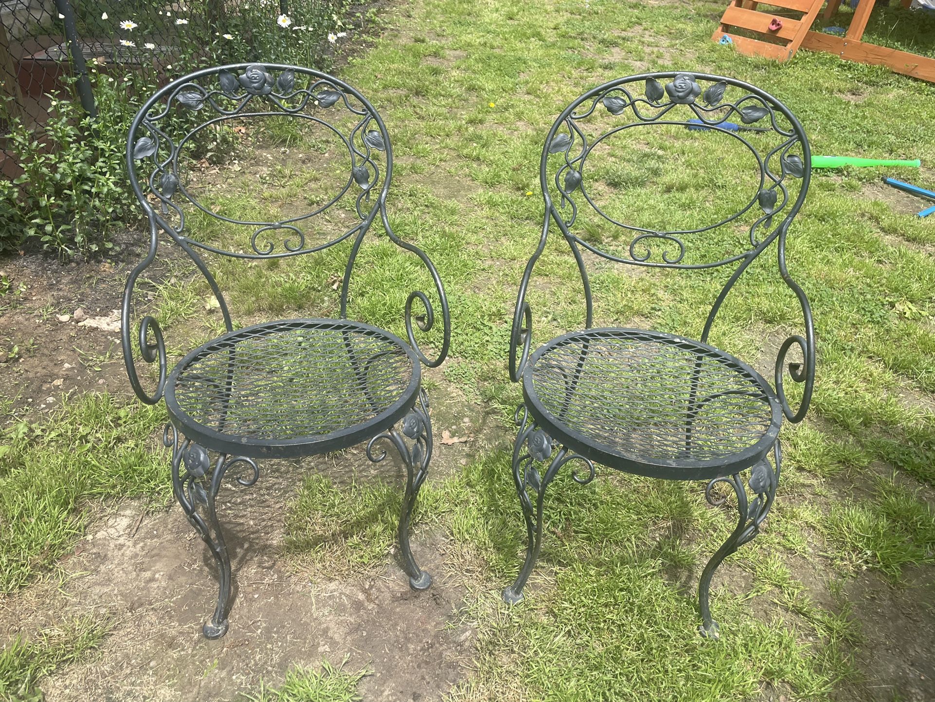 2 Cast Iron Chairs 