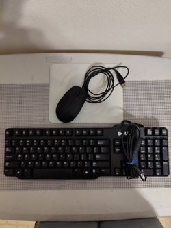 Dell keyboard with mouse and pad