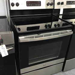 GE 4  Burner Glass Top Stainless Steel Range. 1 year Warranty 