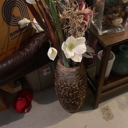 Fake Flowers In A Wooden Vase 