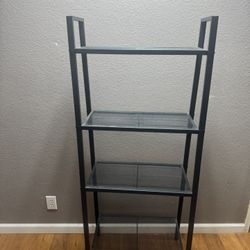 Metal 4-Tier Shelving Unit – Good Condition
